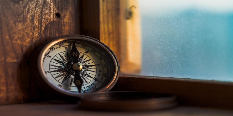 compass next to window